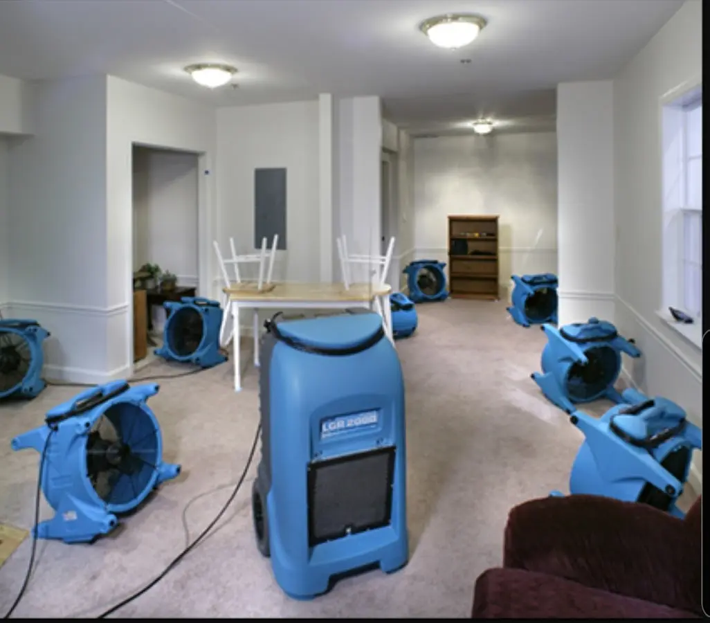 Air movers and dehumidifier setup for Water Damage Restoration in New Hartford